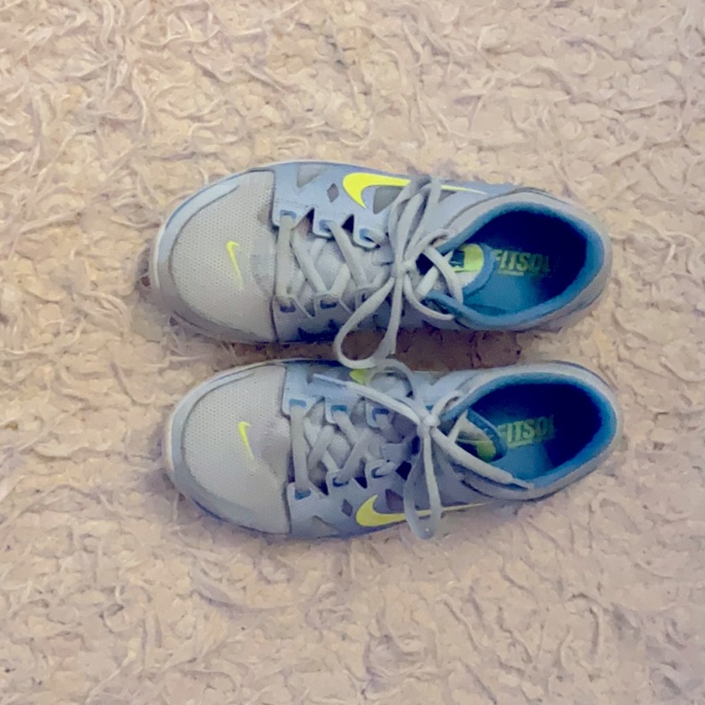 These Nike sneakers are size six and used